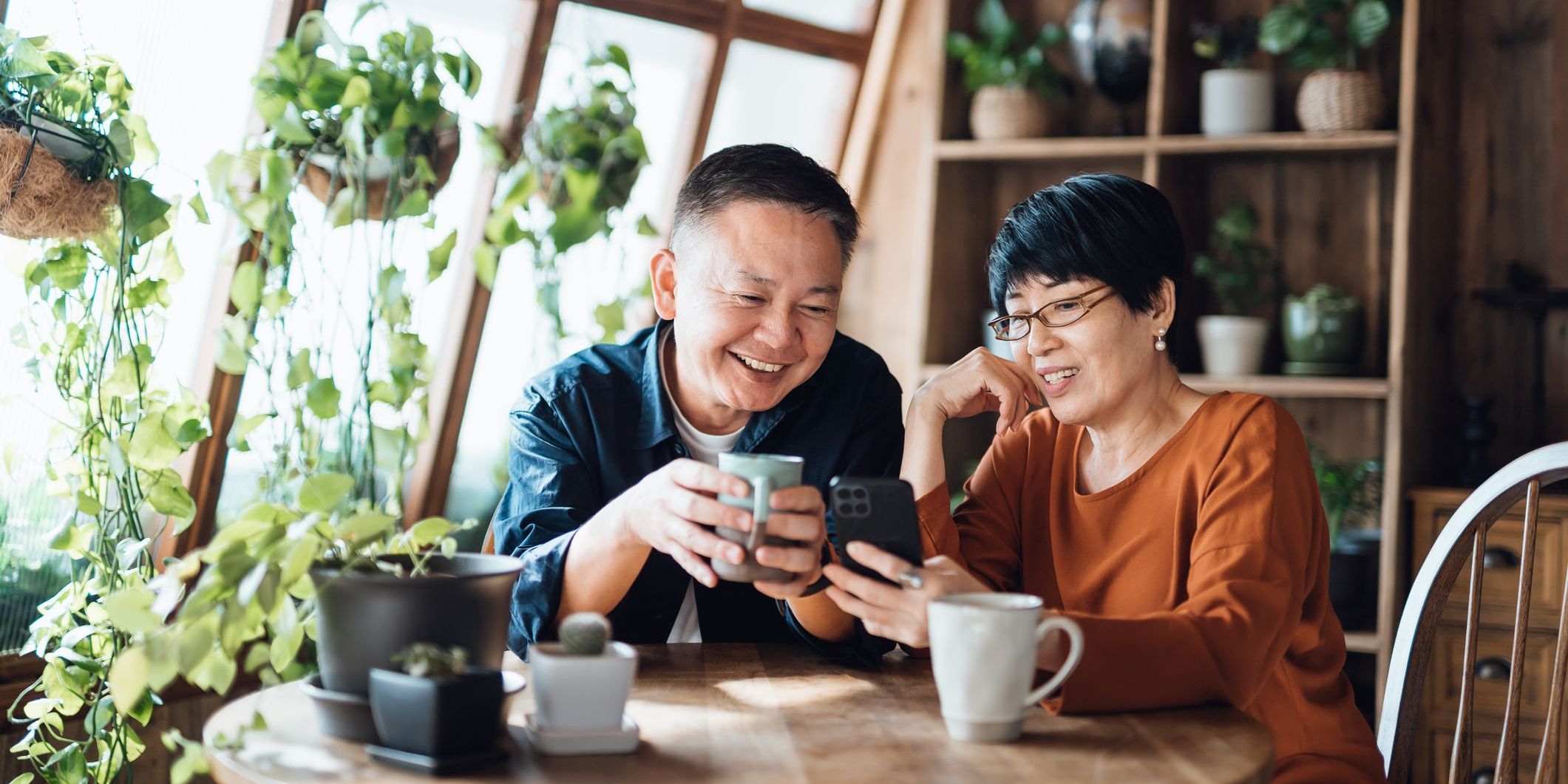 Couple researches financial accounts.