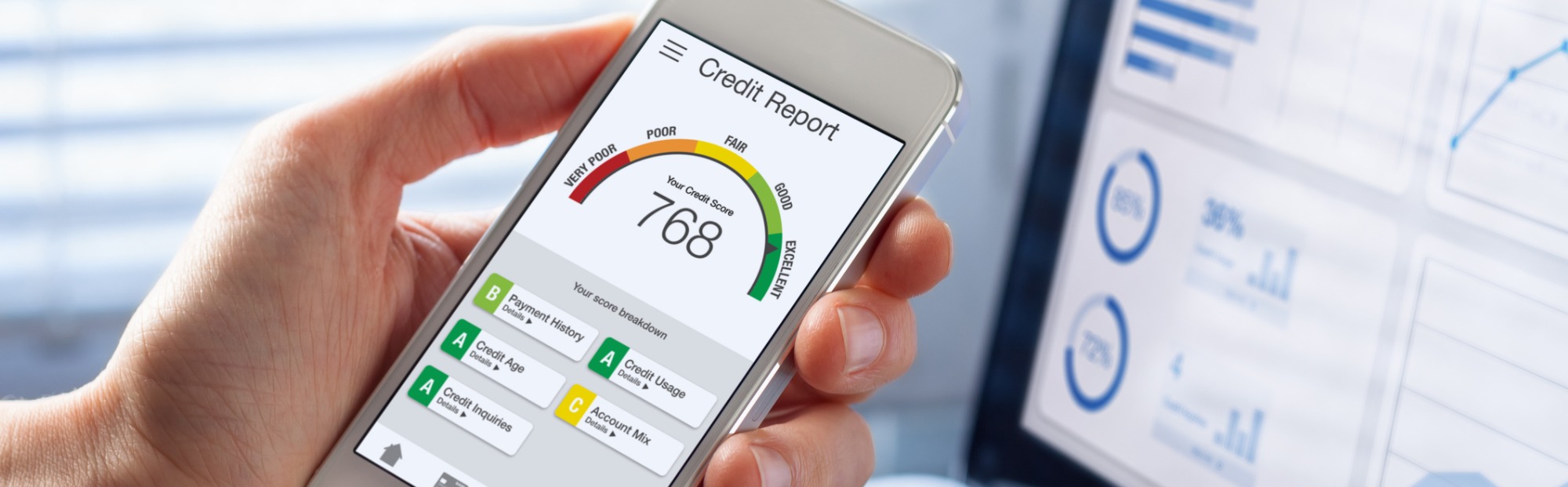 Checking credit report on smartphone app.