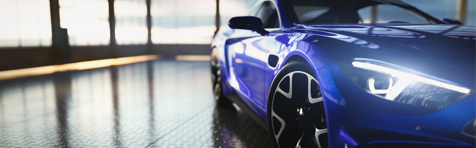 Close Up of Blue Sports Car with Headlight On