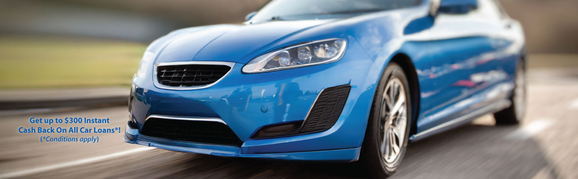 Blue Car with Blurry Backgound