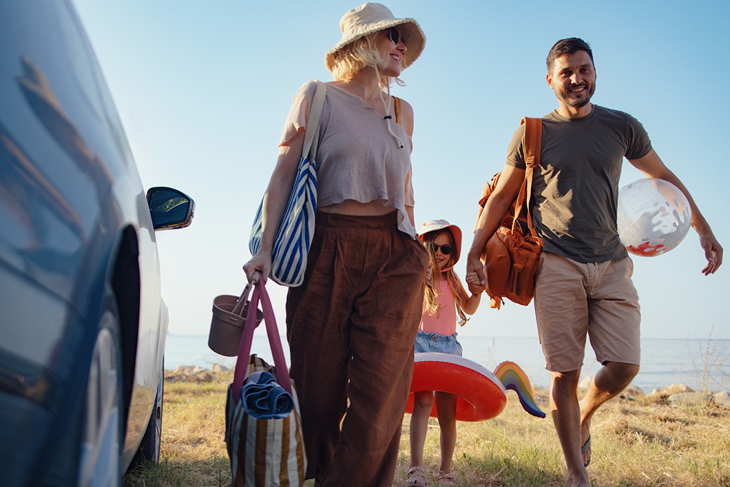 Family Getting in Car on Sunny Day
