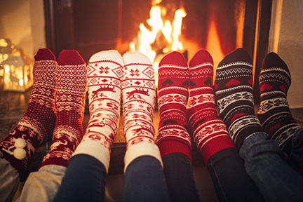 Warm Socks Resting by Fireplace